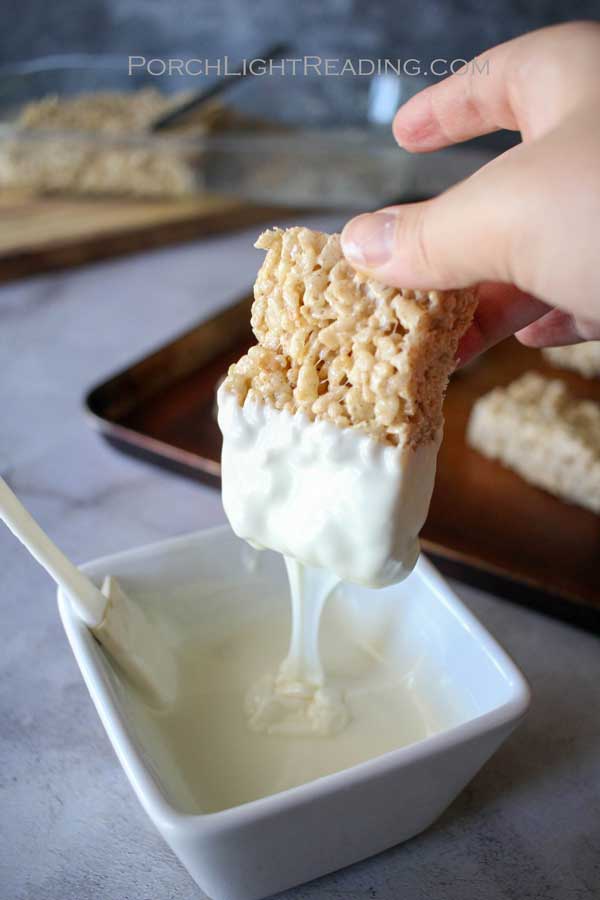 Dip the pumpkin spice Rice Krispie treats rice into white chocolate.
