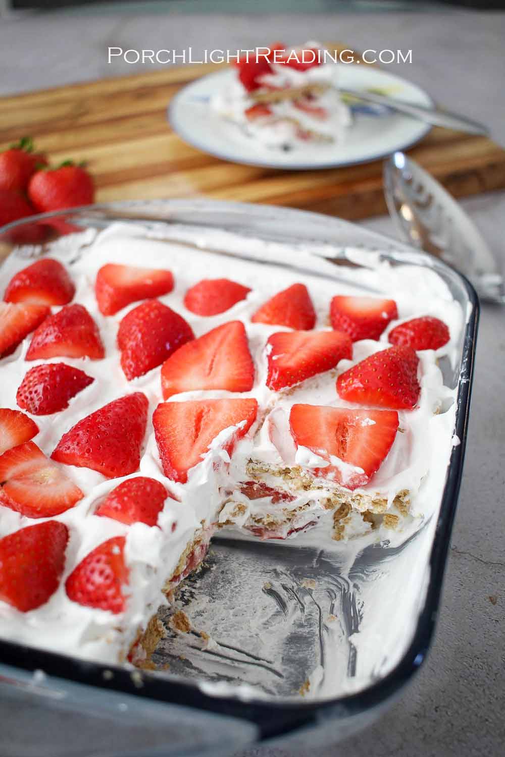Large potluck dish of strawberry ice box cake. 