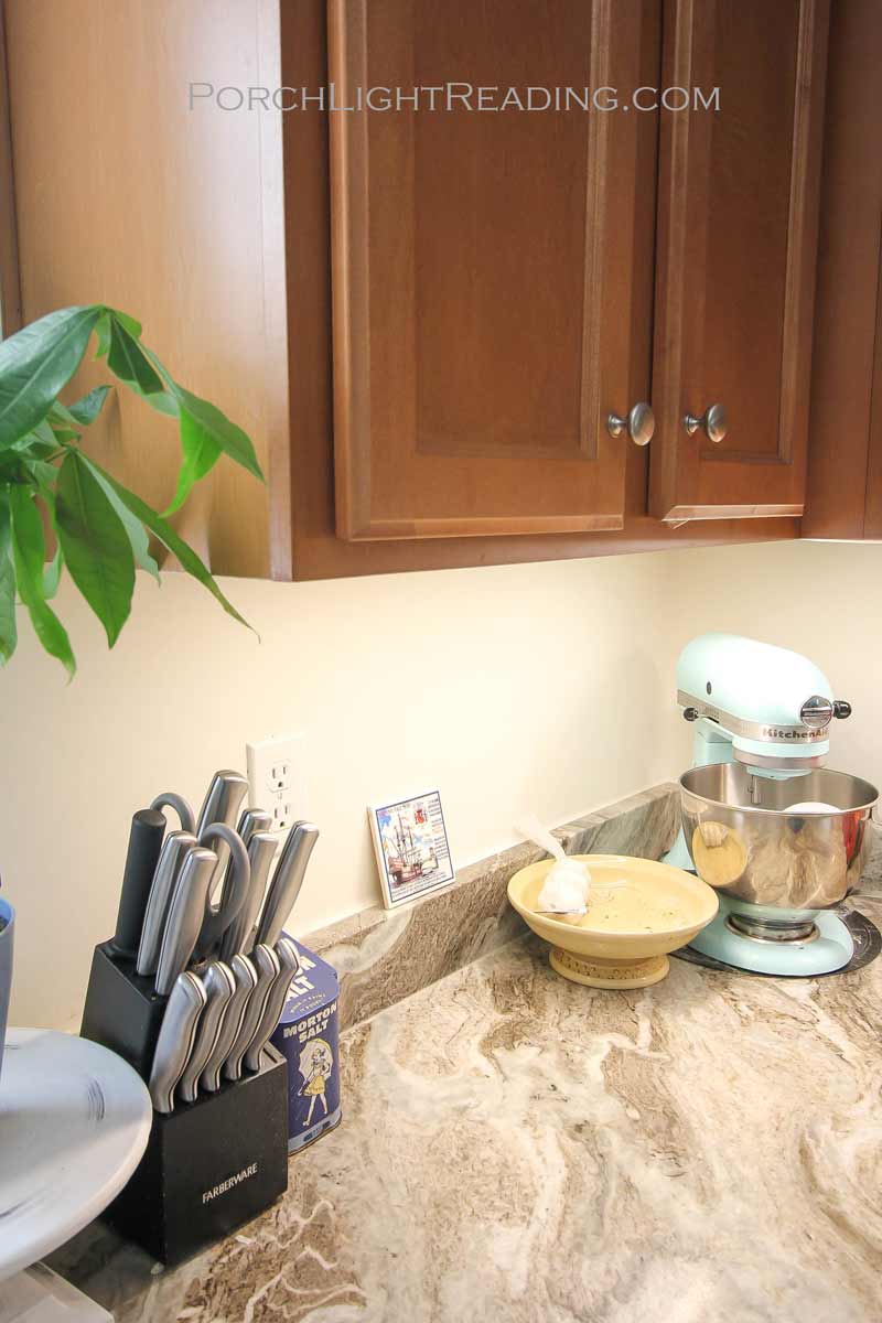 Before a backsplash with white paint.