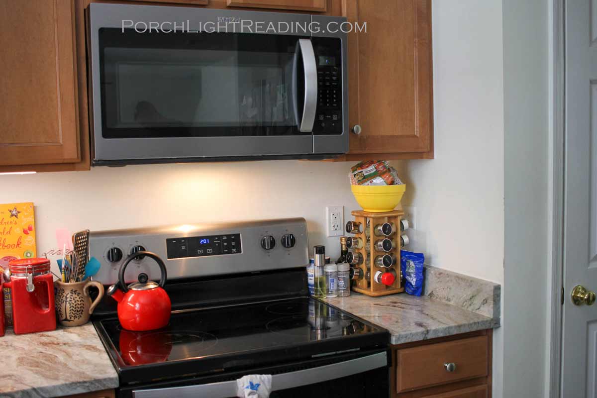 White flat paint behind stove.
