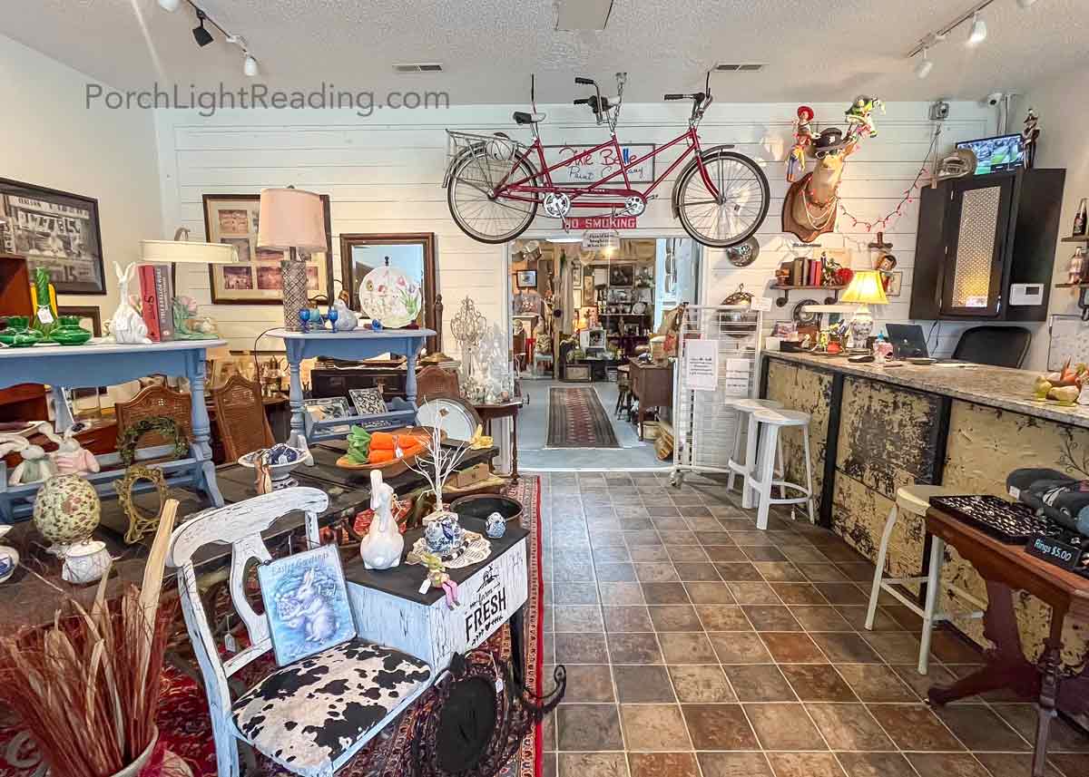 Antique store located in Moncks Corner, South Carolina, with tandem bicycle hanging from doorway.