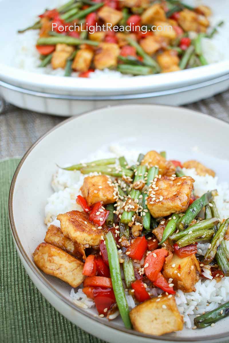 Crispy tofu sprinkled with sesame seeds.