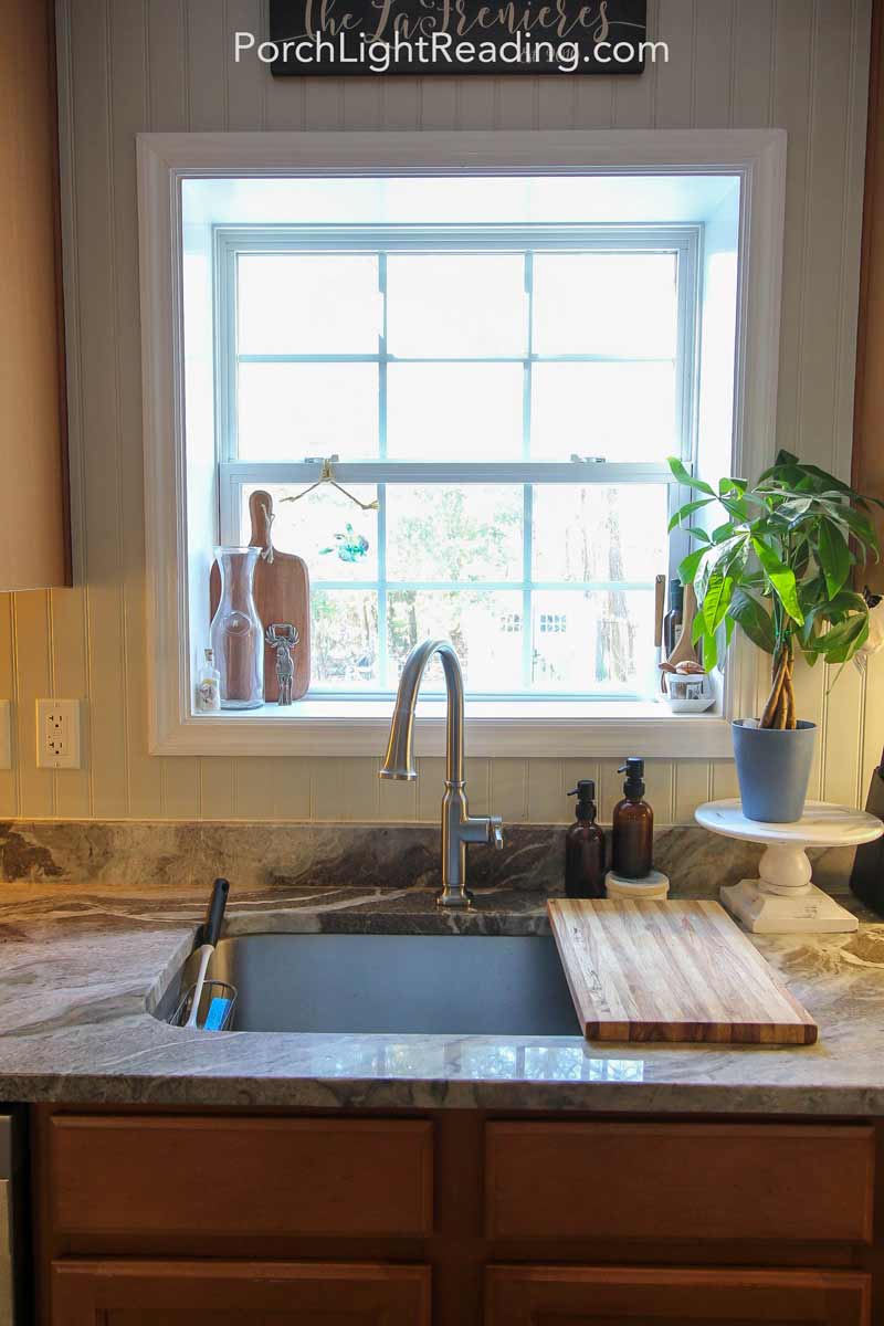 Cutting board over kitchen sink to save space. 
