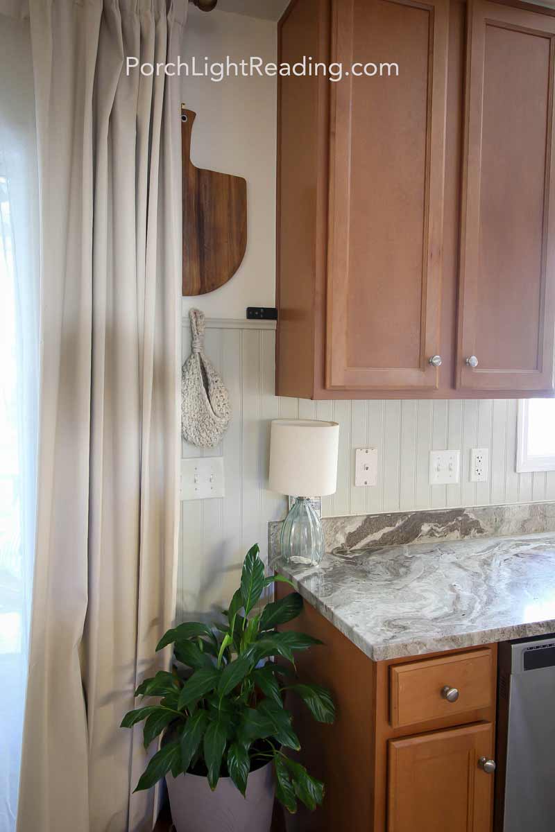 Cutting board and baskets along the wall. 