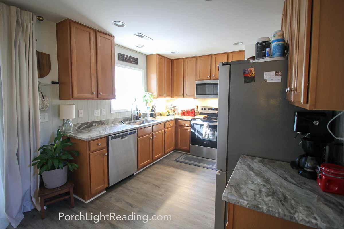 Organized small kitchen with clean countertops. 