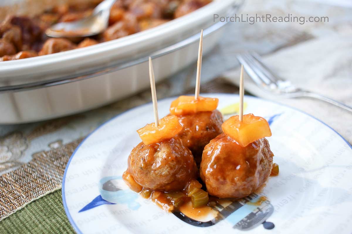 A plate of Hawaiian meatballs with ground turkey, pineapple chunks, and a sweet and tangy sauce.