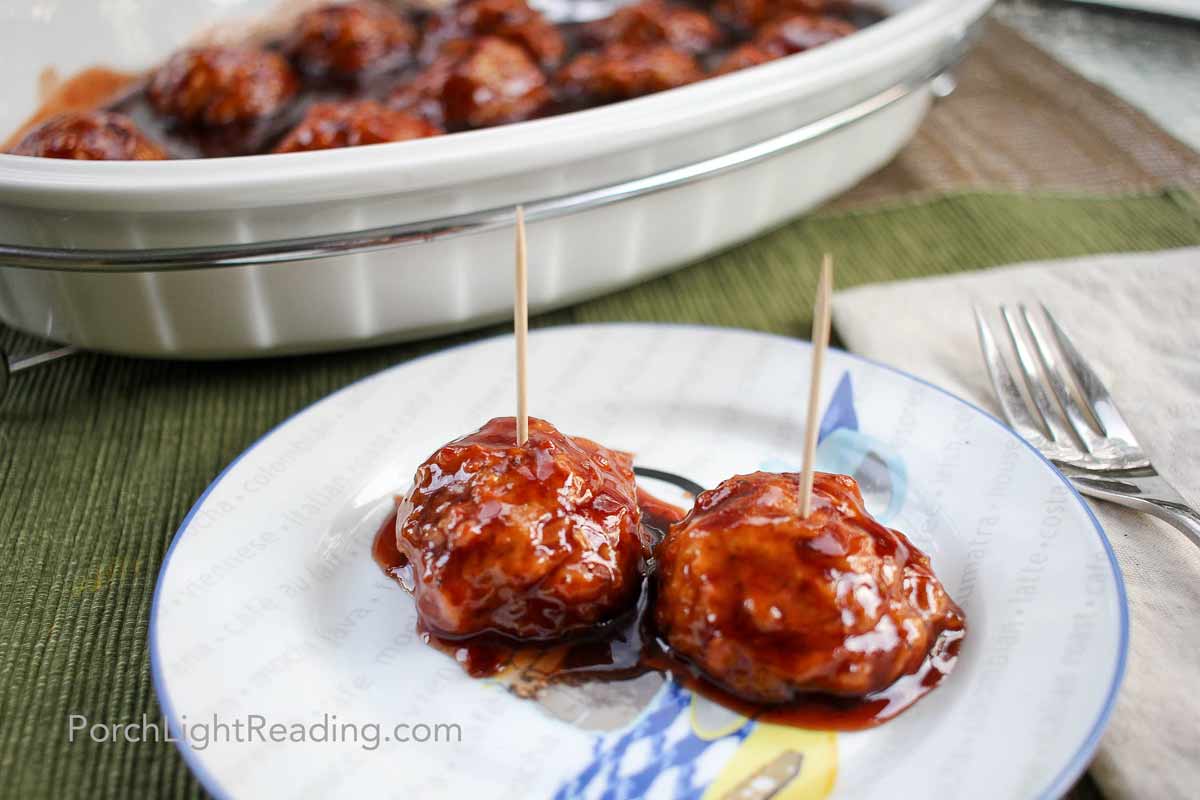 Two vegetarian meatballs served as an appetizer with toothpicks. 