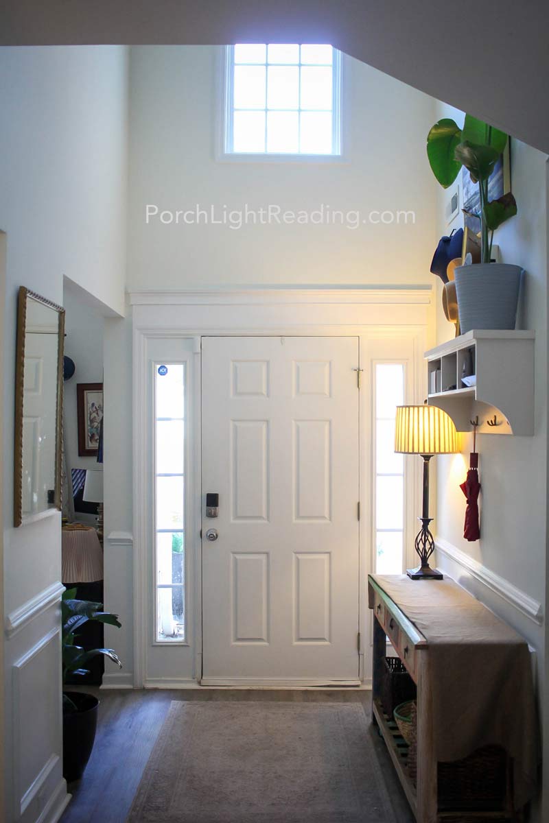 White door with four inch trim and crown ornamental crown molding. 