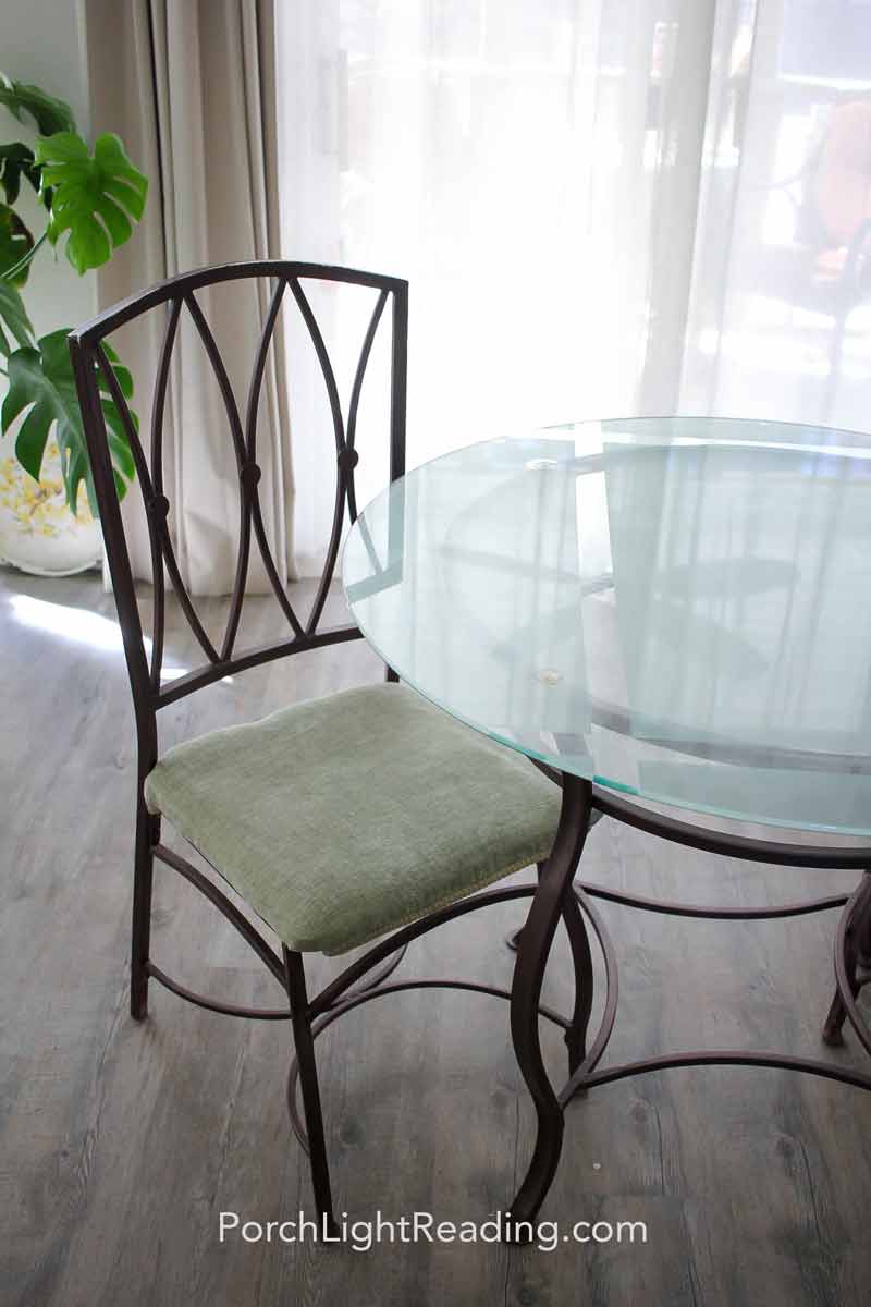 New dark brown chair with olive green chair cushion.