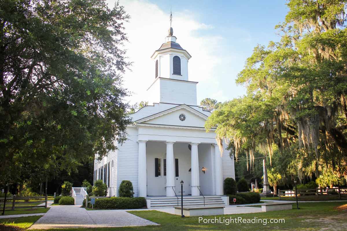 White church with four large columns. 