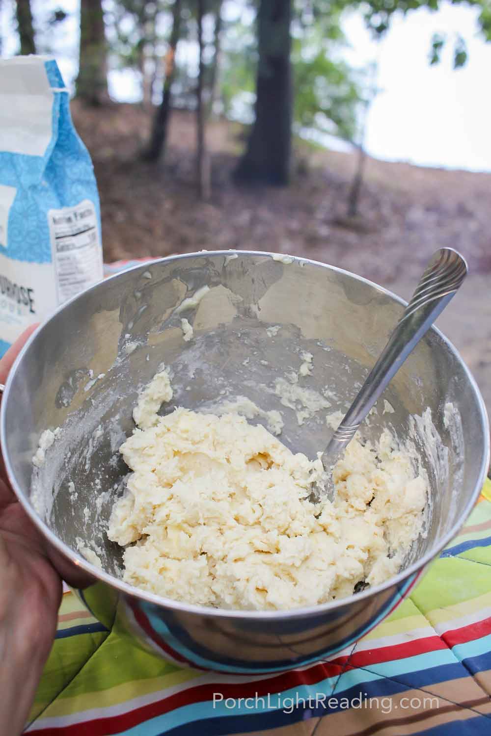 Biscuit dough in a metal bowl. 