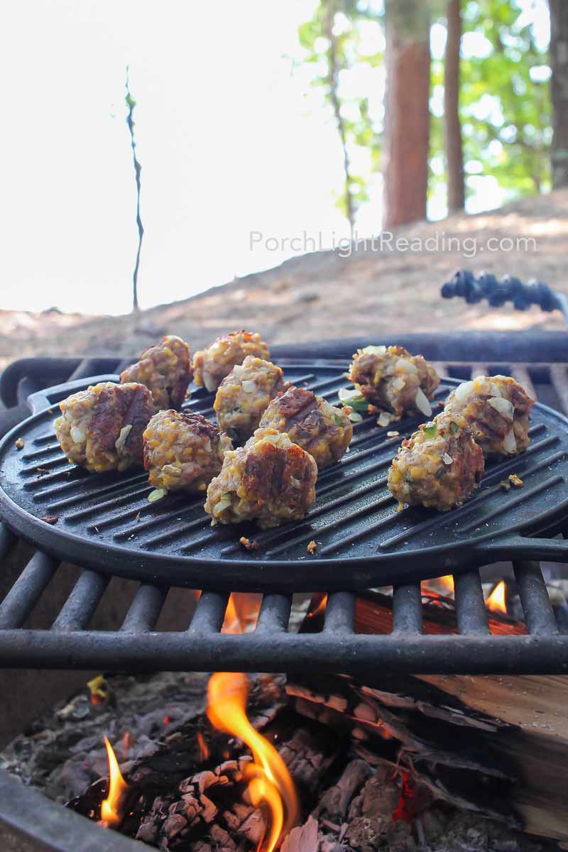 Sausage balls cooking over the campfire.