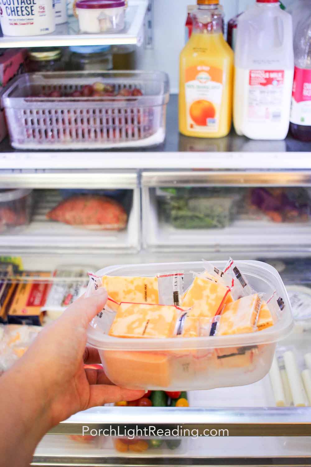 Healthy fridge snacks for kids in clear containers. 