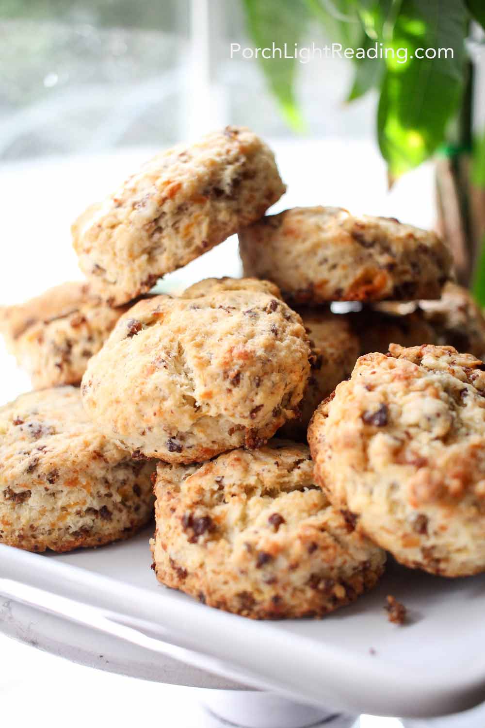 Plate of warm breakfast scones with sausage and cheese. 
