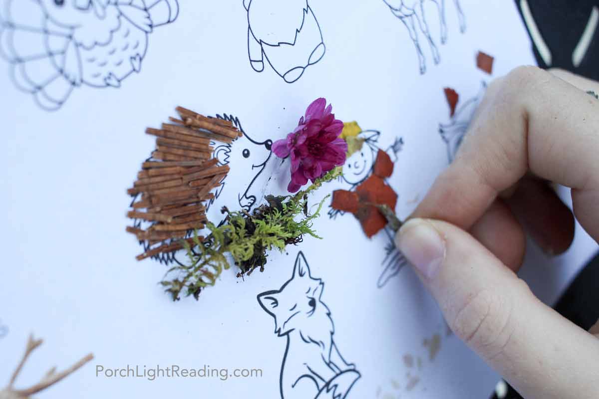 Little girl creating using pine needles to make a picture of a hedgehog. 