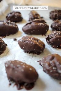 Date snickers filled with peanut butter and nuts and coated in chocolate.