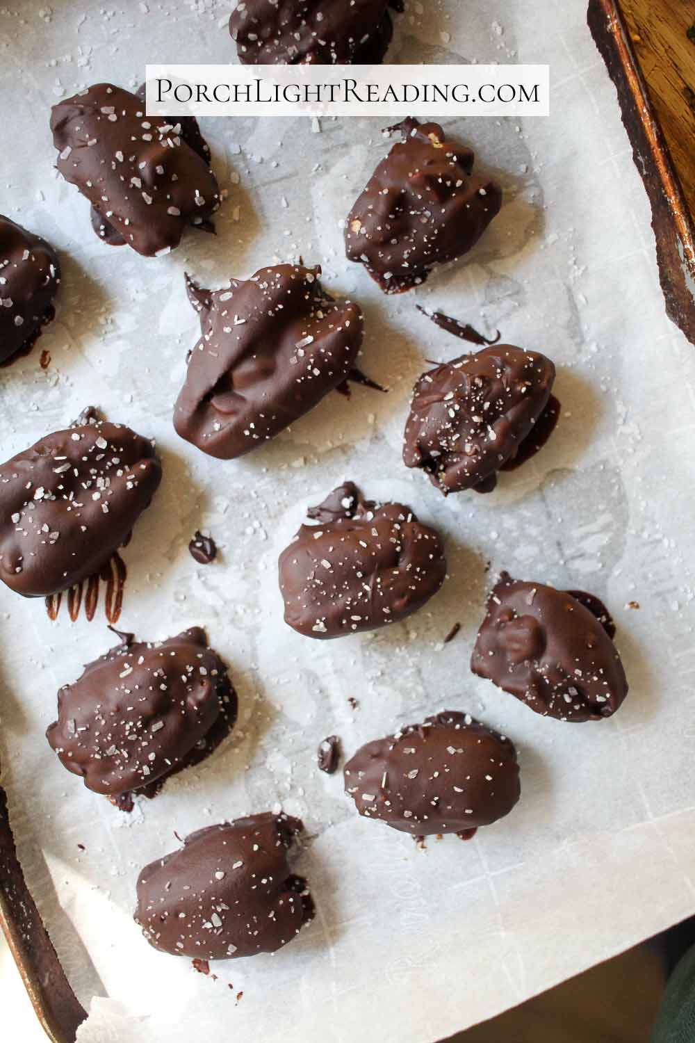 Homemade healthy snickers on parchment paper.