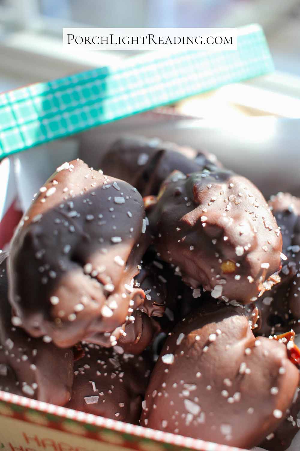 Salted covered chocolate snickers dates in a box. 