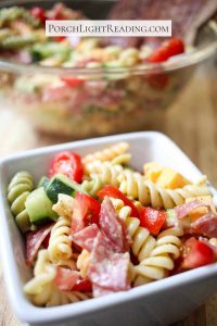 Pasta salad served in a white bowl.