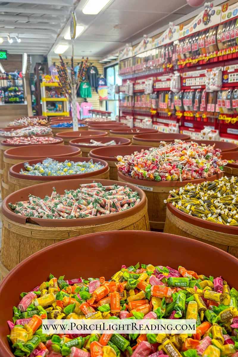 Giant barrels overflowing with colorful candy. 