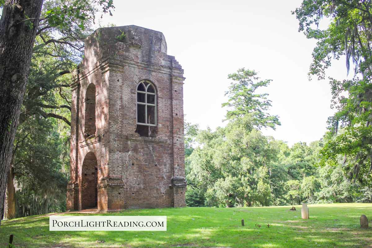 Old ruin tower in an open field. 