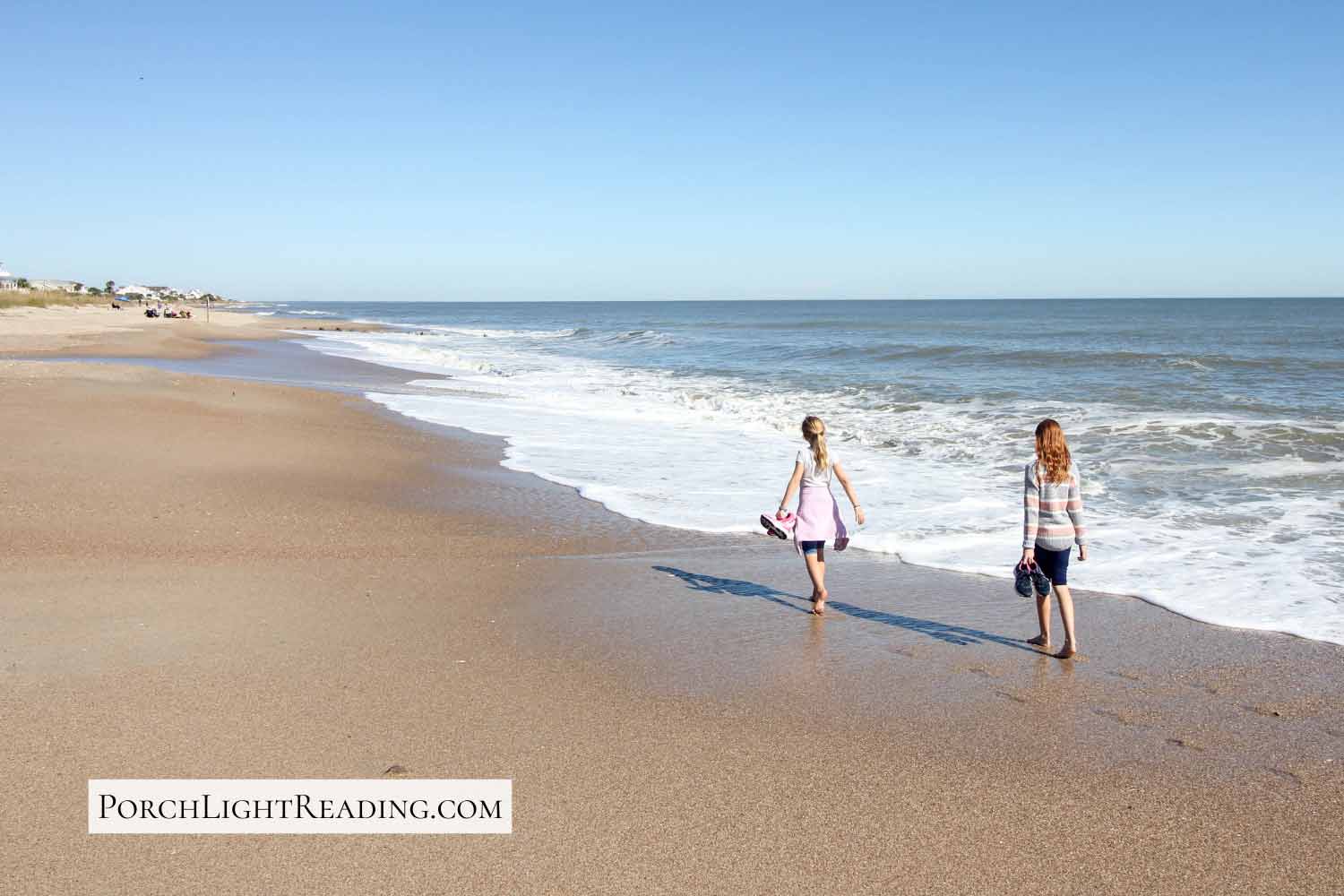 Kids walking along the Edisto Beach, South Carolina. 
