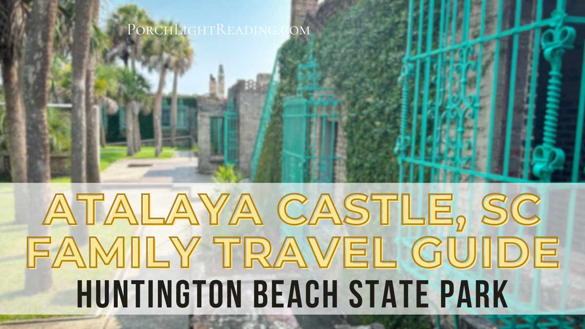 Atalalya Castle with teal grates over the windows and palm trees in the garden. 