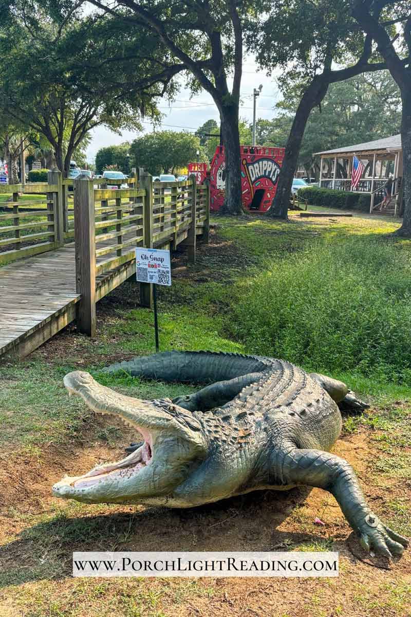 Alligators statue in front of the shops at Murrells Inlet. 