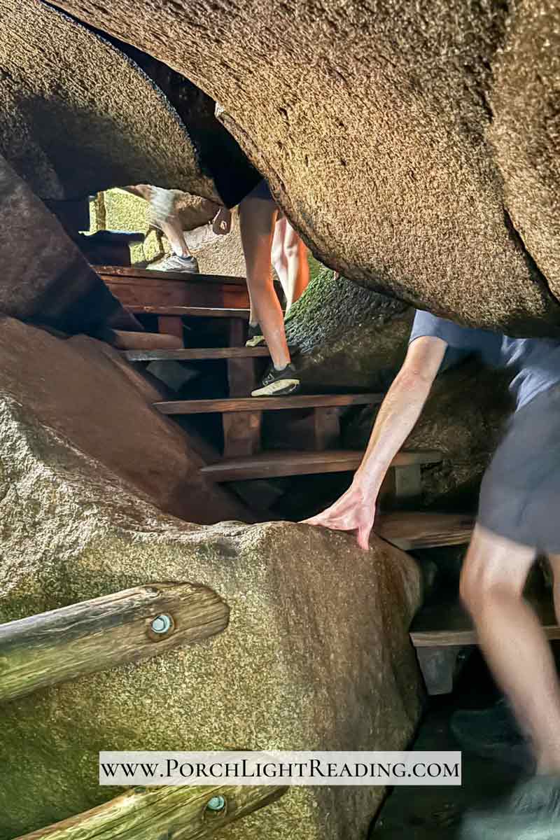 Climbing through a cave.